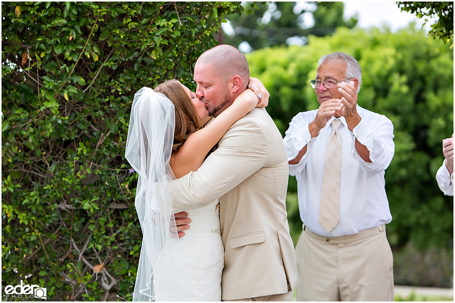 The Thursday Club Wedding - ceremony kiss