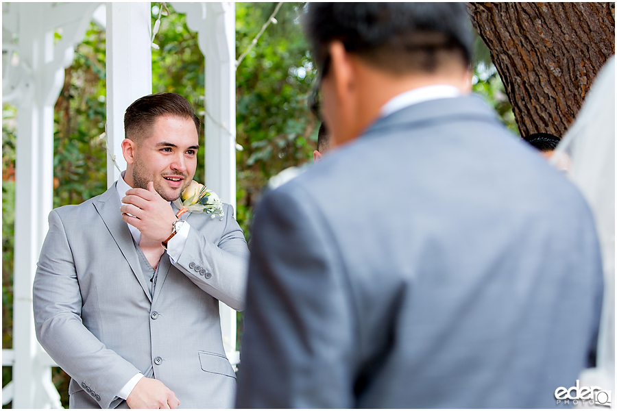 Groom crying during ceremony at Green Gables Wedding Estate