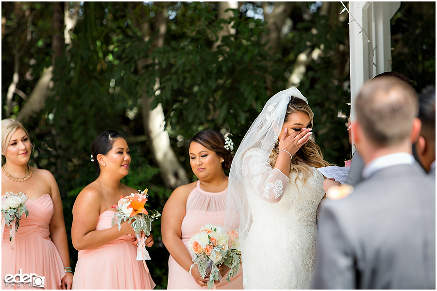 Bride crying during ceremony at Green Gables Wedding Estate