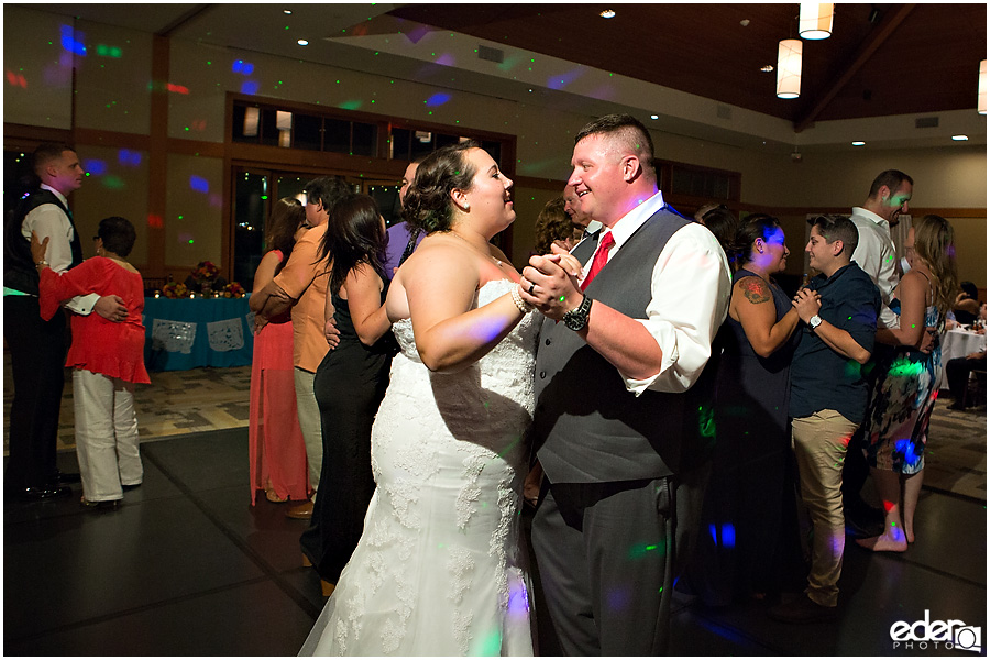 Bride and groom dancing during their wedding in Coronado, CA.