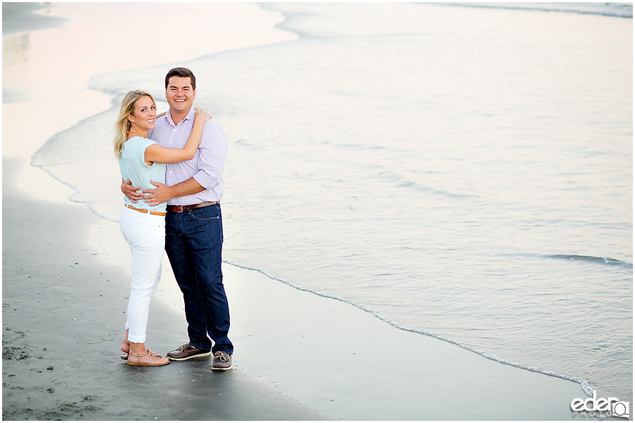 Couple on the beach in front of the hotel del. 