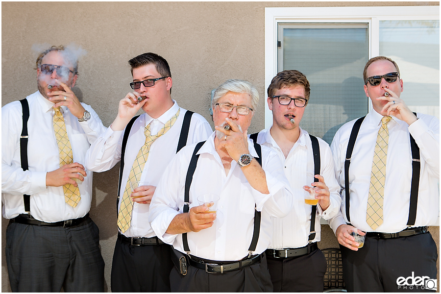 At-Home Wedding Photography back yard reception smoking cigars.