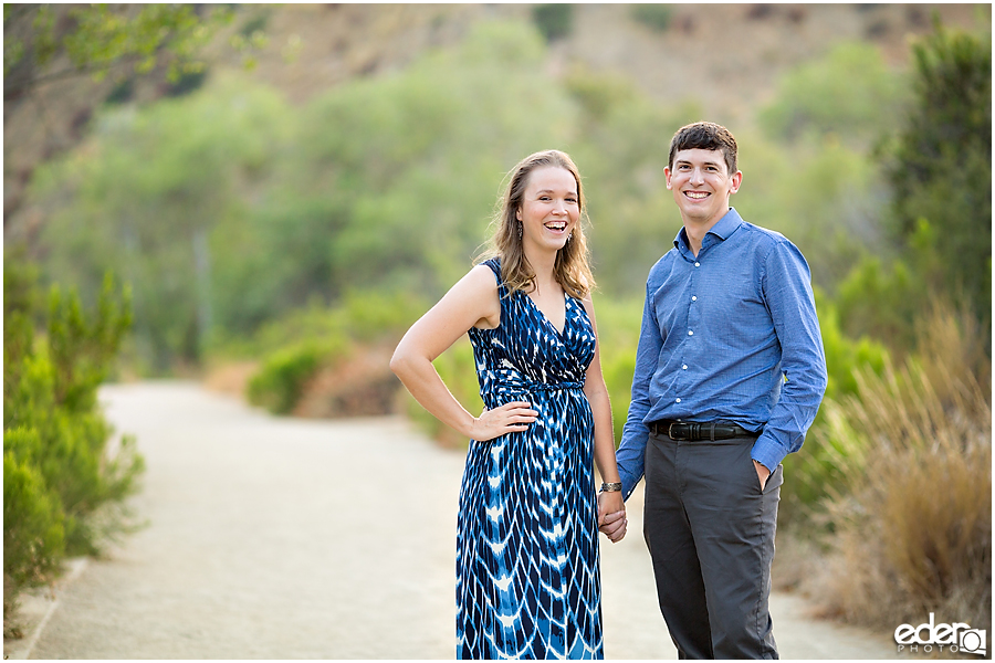 Walking down a trail during an engagement session in Mission Trails Regional Park.