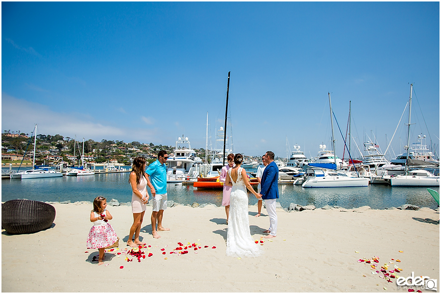 Ceremony during beach elopement at the Kona Kai Resort in San Diego, CA.