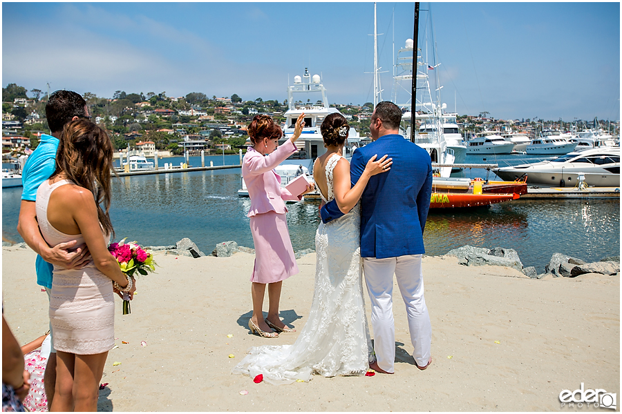 Deborah Young officiating beach elopement at the Kona Kai Resort in San Diego, CA.