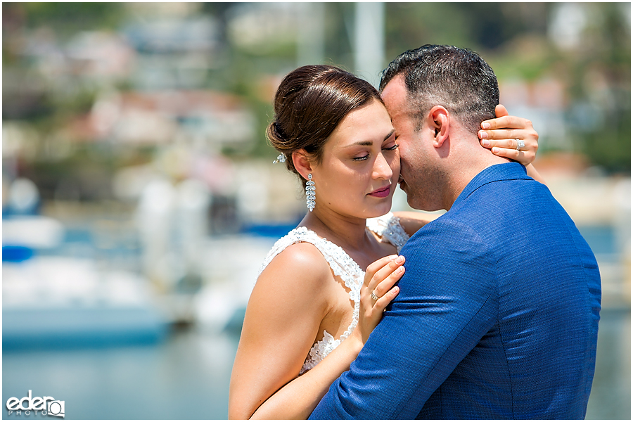 Bride and groom during beach elopement at the Kona Kai Resort in San Diego, CA.