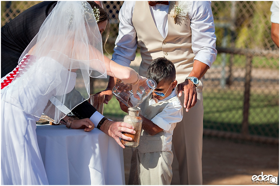 Sand ceremony baseball themed wedding ceremony. 