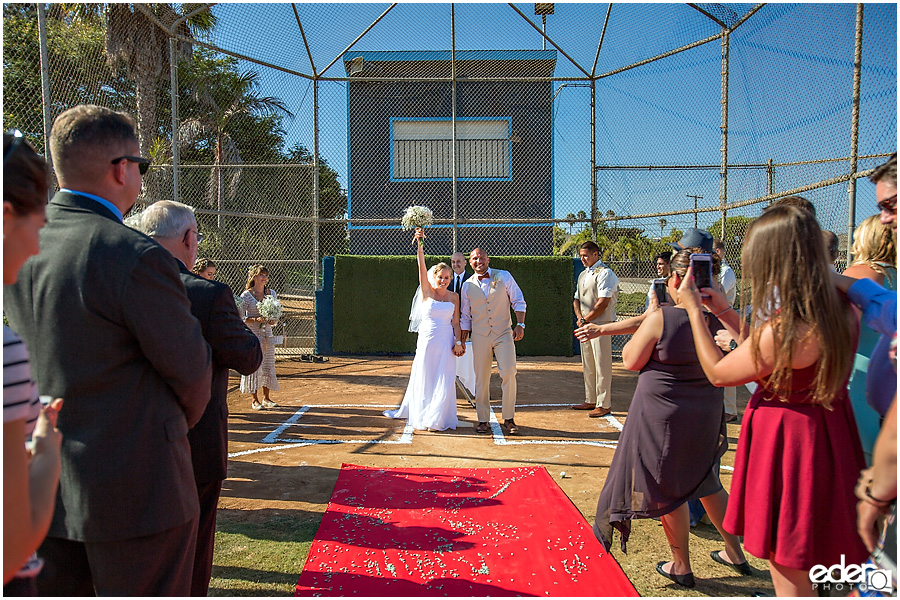 Celebration after baseball themed wedding ceremony. 