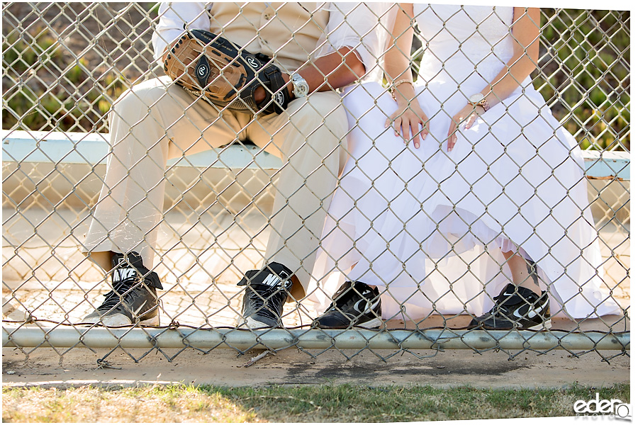 Bride and groom wearing baseball cleats. 