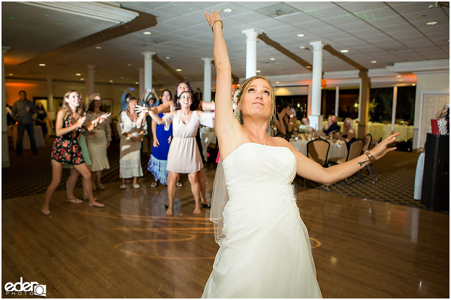 Bouquet toss at Admiral Kidd Club Wedding. 