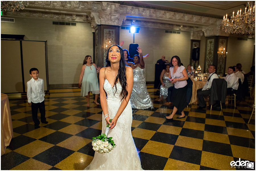 Bouquet toss at Crystal Ballroom Wedding Reception