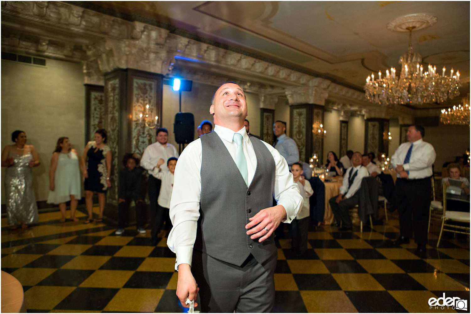 Garter toss at Crystal Ballroom Wedding Reception