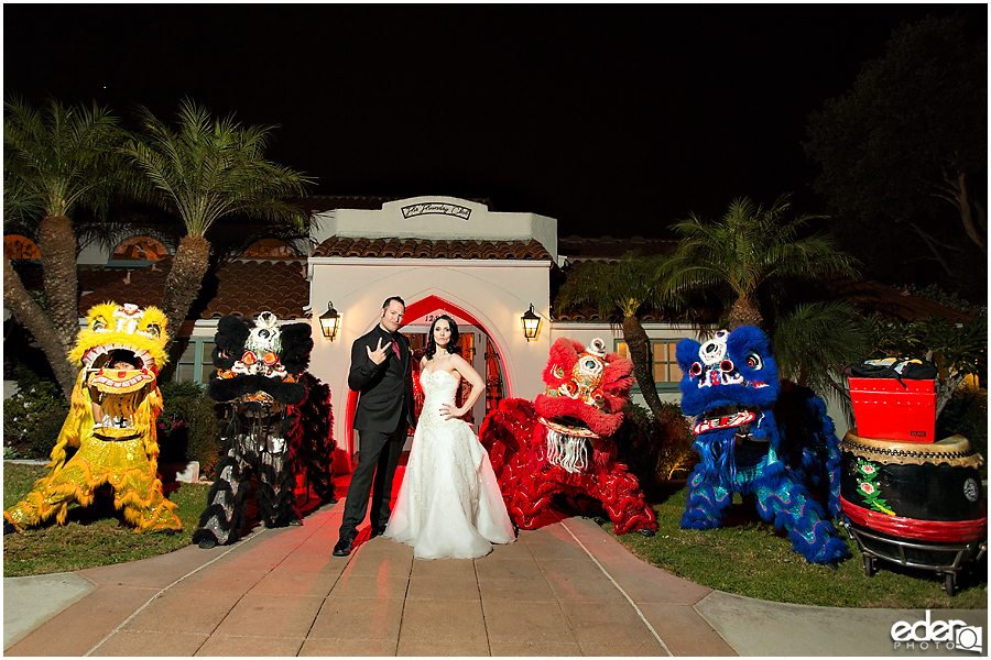 Bride and groom and dragon dancers