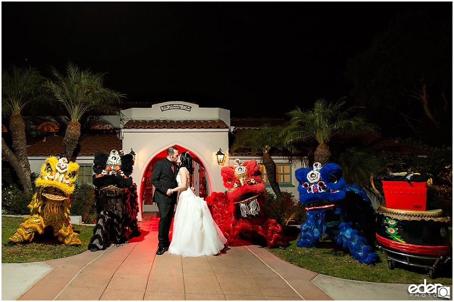 bride and groom and dragon dancers