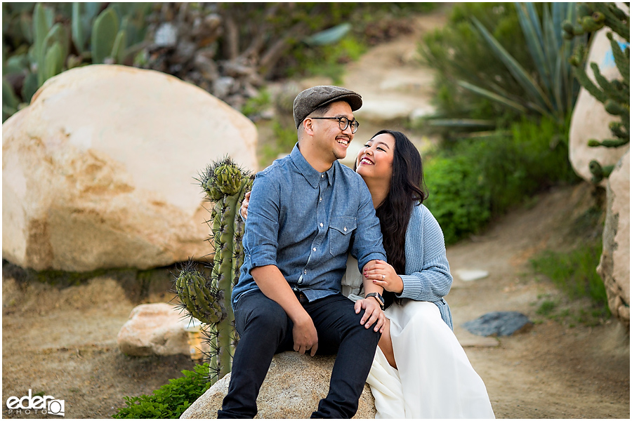 Balboa Park Engagement Session sitting in Cactus Garden.