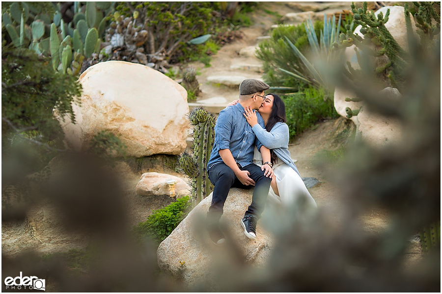 Balboa Park Engagement Session kissing in Cactus Garden.