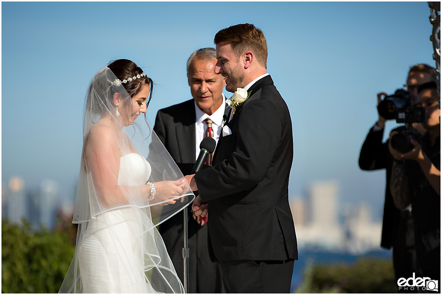 Ring exchange during ceremony at Tom Ham's Lighthouse