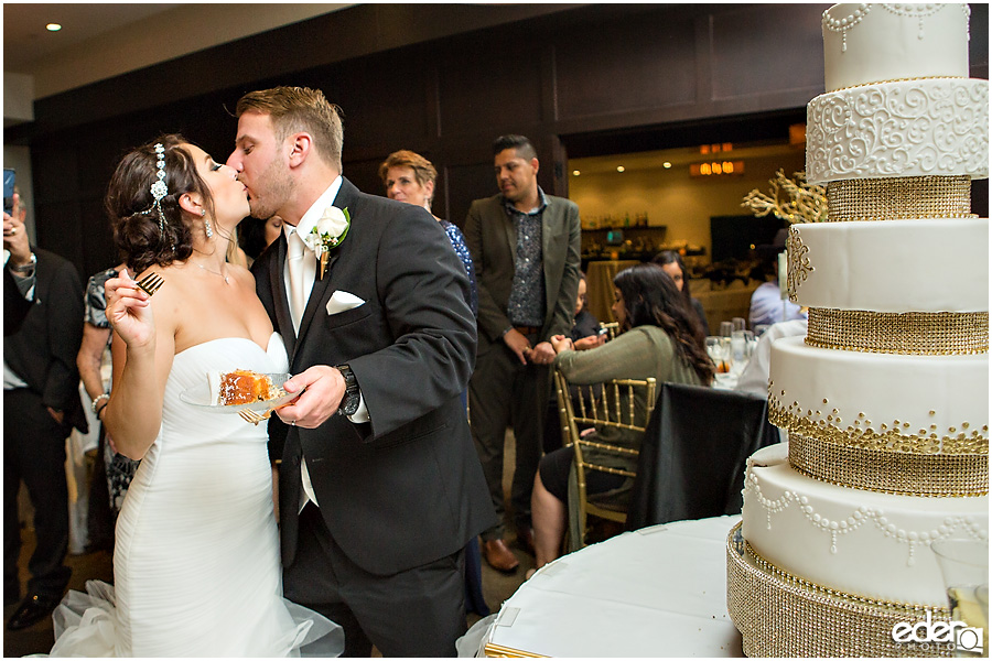 Cake cutting for Tom Ham's Lighthouse Wedding Photography