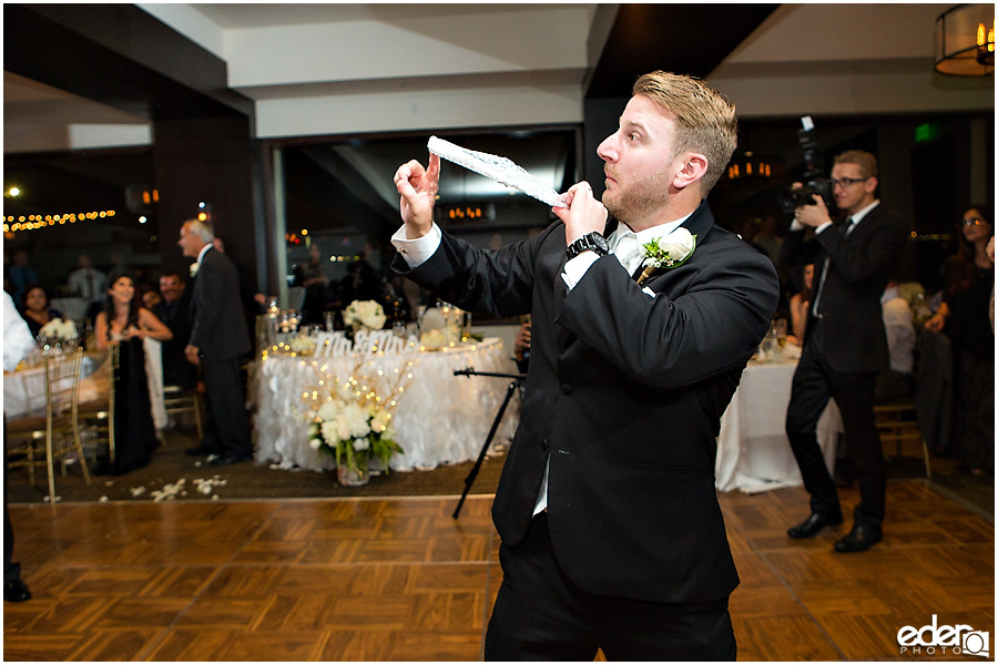 Garter toss for Tom Ham's Lighthouse Wedding Photography