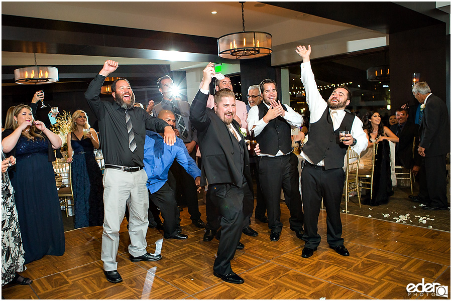 Garter toss for Tom Ham's Lighthouse Wedding Photography