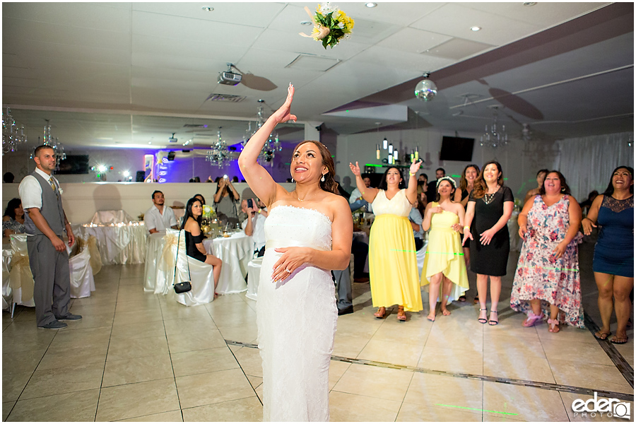 Bouquet toss at wedding reception at Just Java in Chula Vista.