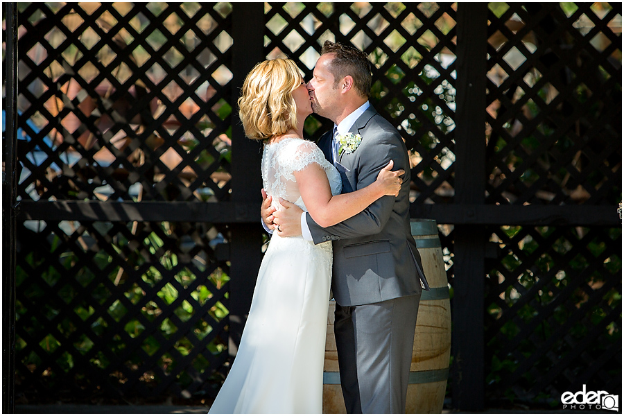 Rancho Bernardo Winery Wedding Wedding Ceremony first kiss