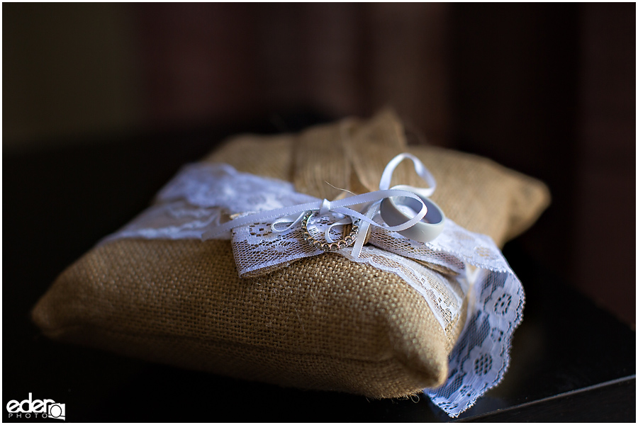 Wedding rings on pillow.