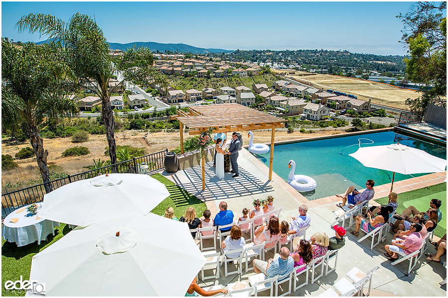 Pool wedding ceremony overhead shot.