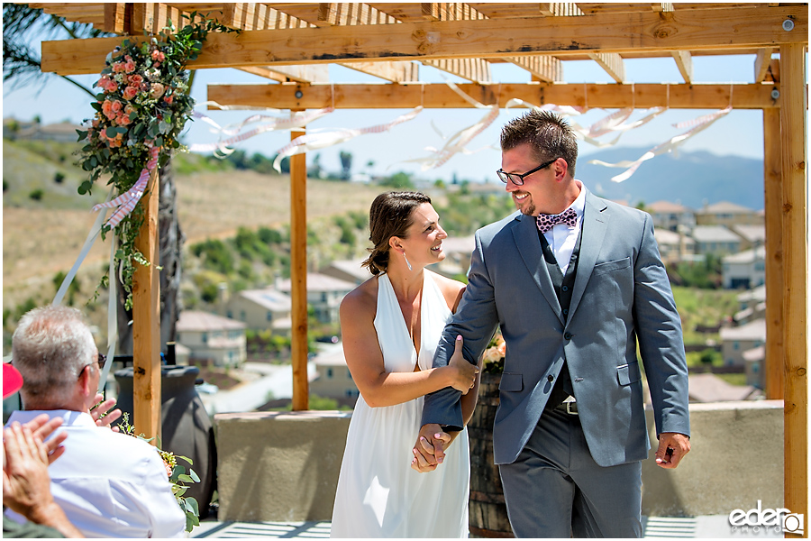 Pool wedding ceremony recessional.