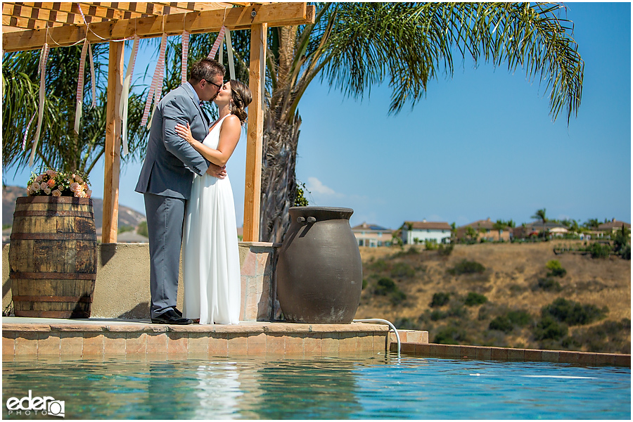 Pool wedding bride and groom.