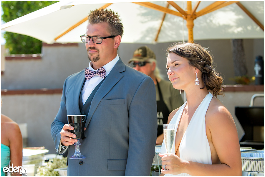 Pool wedding reception toasts.