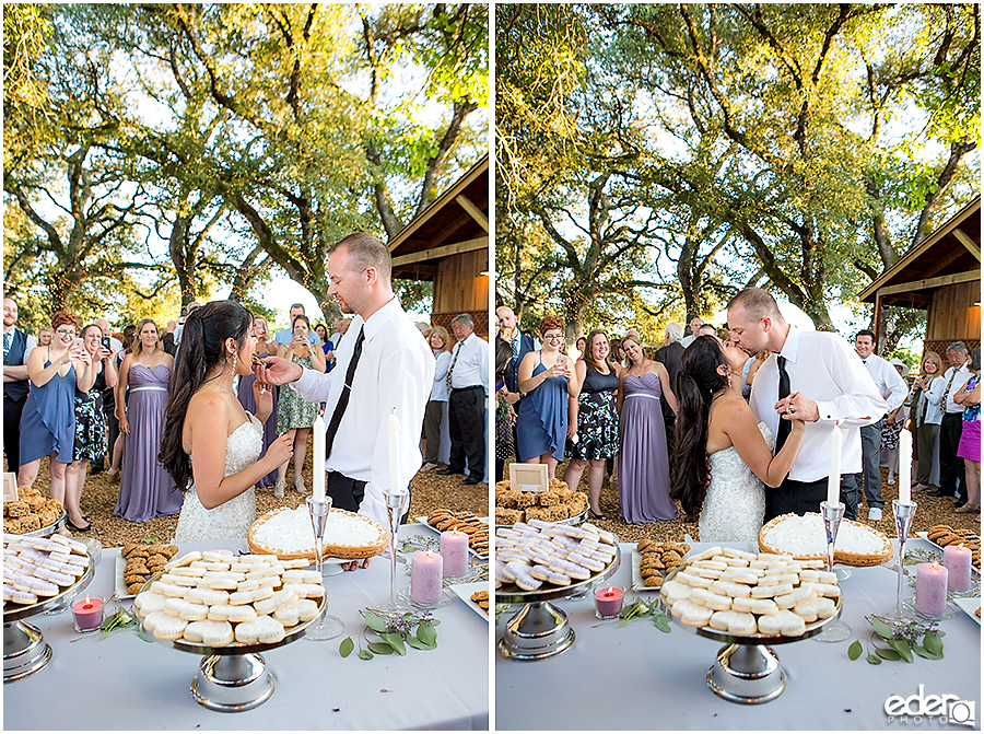 Vineyard Wedding bride and groom cookie cutting.