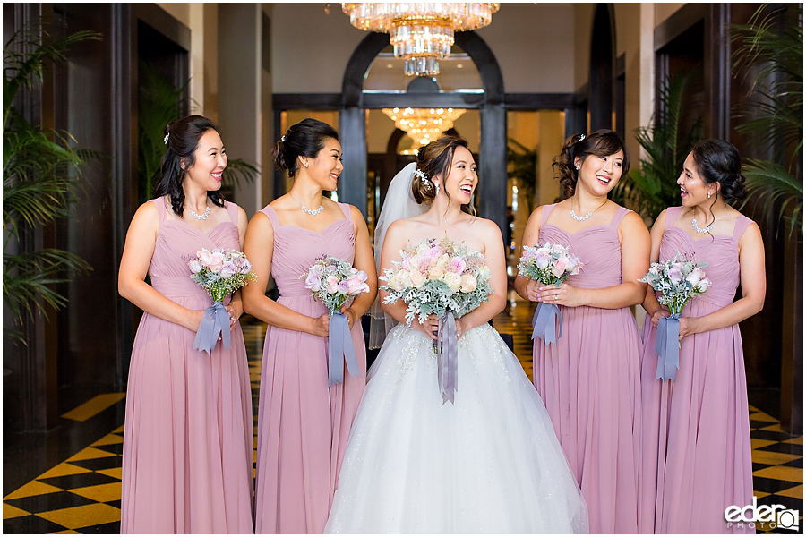 Wedding at The US Grant - photo of bridesmaids with chandeliers.