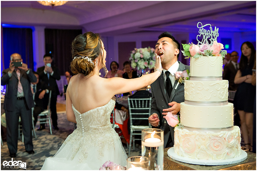 Wedding at The US Grant - photo of couple cutting the cake.