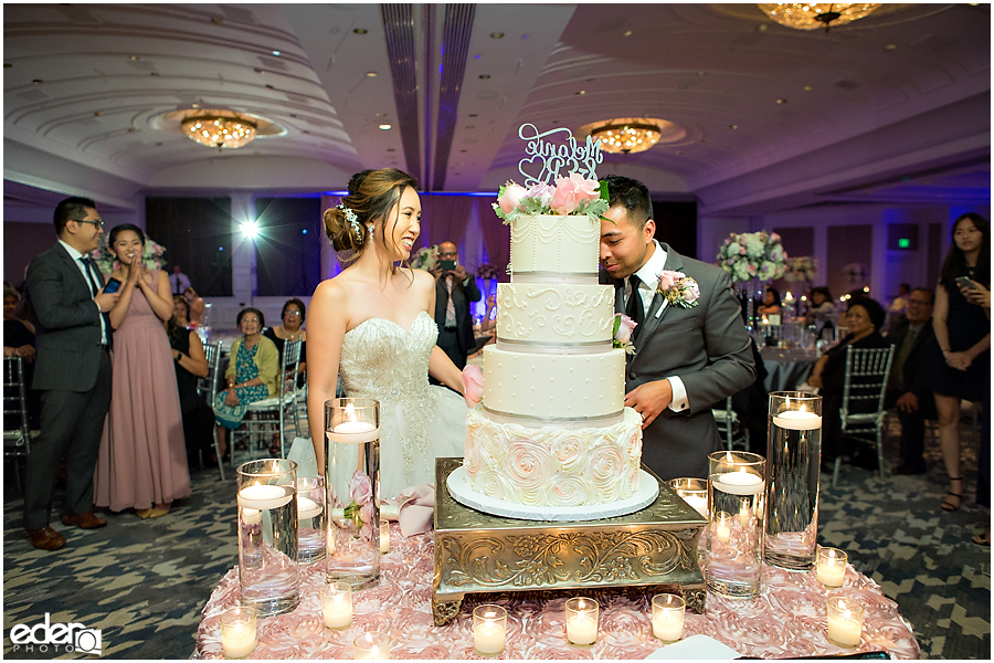 Wedding at The US Grant - photo of couple cutting the cake.