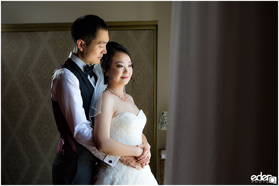 Small Winter Wedding La Jolla - bride and groom window portrait