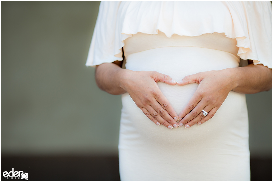 Balboa Park maternity session heart on belly.