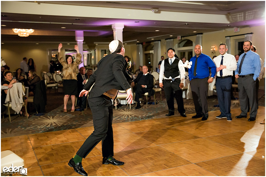 Kona Kai Wedding reception garter toss.