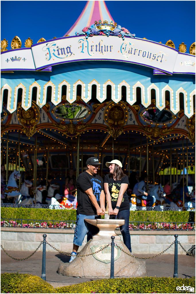 Disneyland Engagement Session in front of carousel.