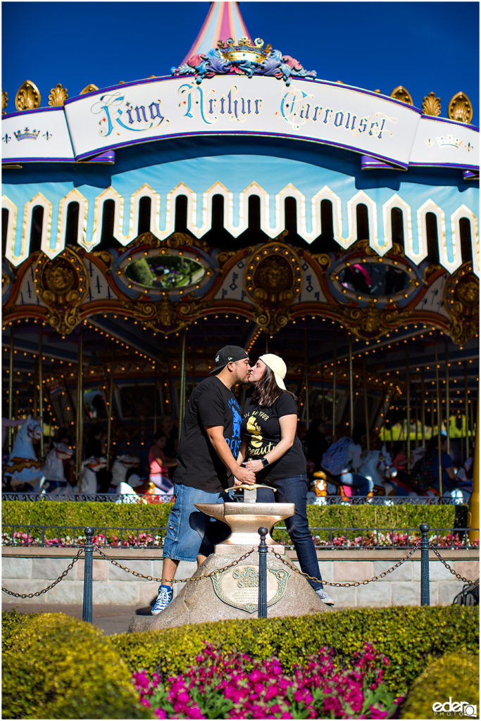 Disneyland Engagement Session in front of carousel.