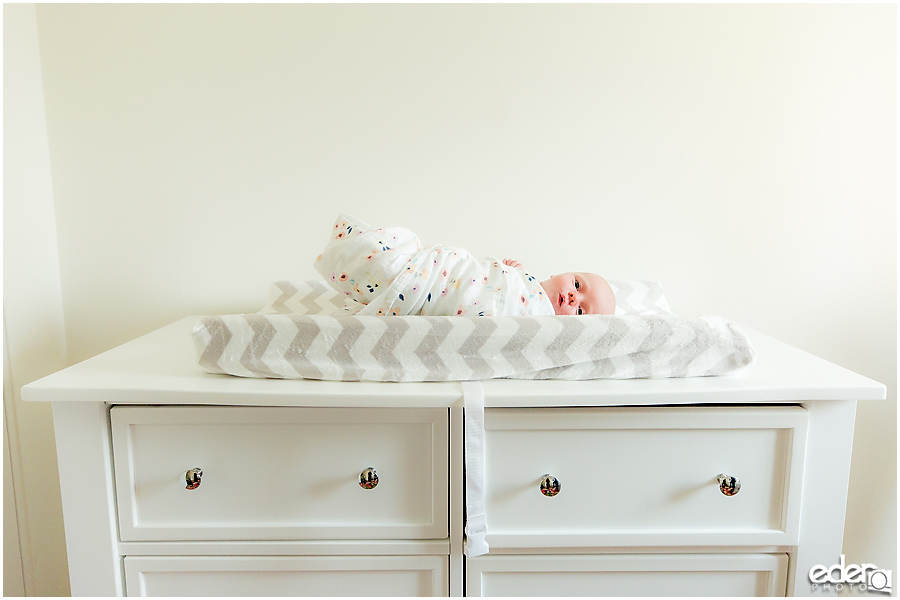 Newborn Lifestyle Portrait Session - baby on changing table.