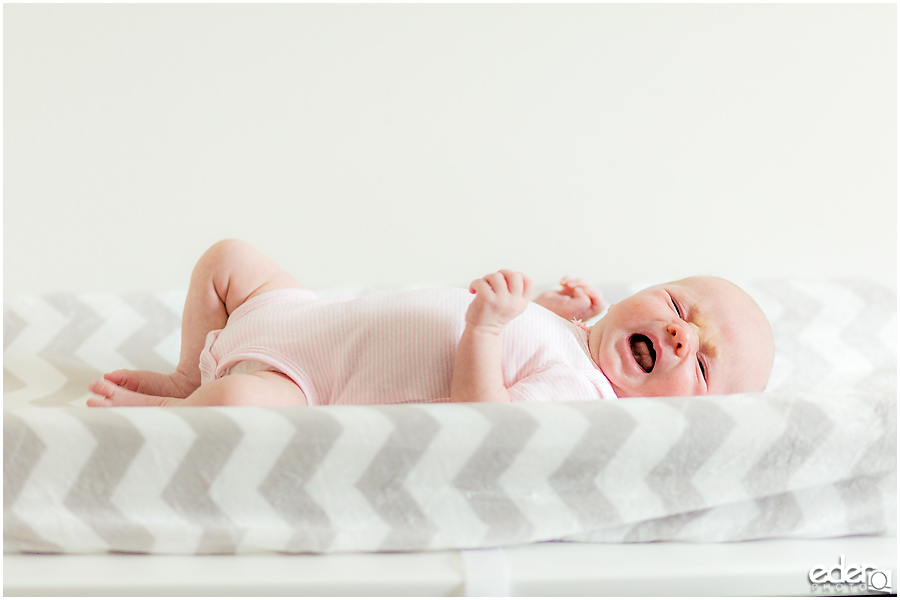 Newborn Lifestyle Portrait Session - baby on changing table.