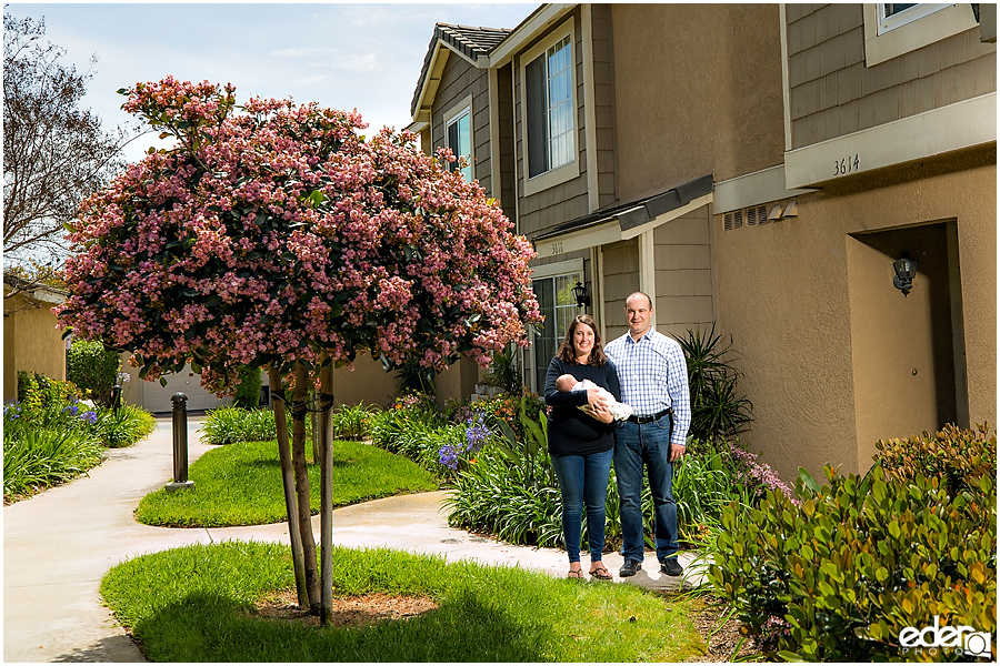 Newborn Lifestyle Portrait Session - Family Photo in front of Home.