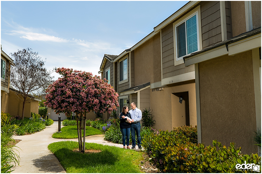 Newborn Lifestyle Portrait Session - Family Photo in front of Home.