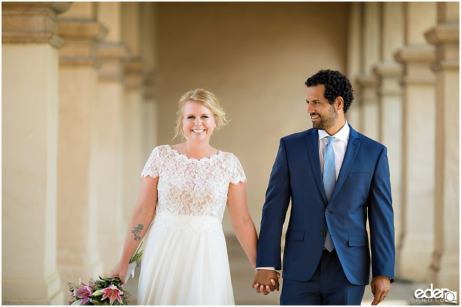 San Diego Elopement photography at Balboa Park in between columns. 
