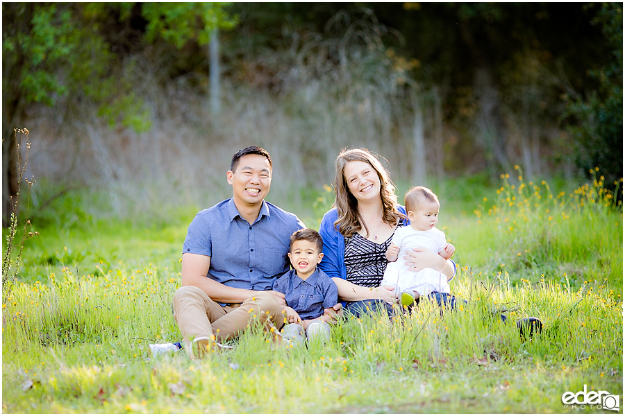 Spring Mini Portrait Session - family sitting in field